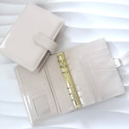 A6 Glossy | goldene Ringe | Kunst Leder | creme beige | schwarz