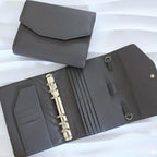 A6 Pocket | goldene Ringe | Saffiano Leder